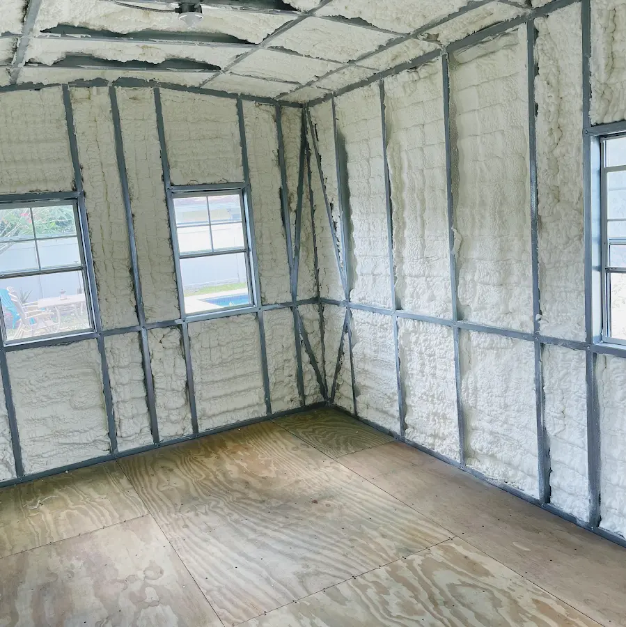 Closed-cell spray foam insulation applied to wall cavities in a residential project in Powell